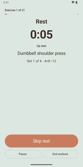 Trailhead guided workout showing a rest countdown and the next exercise, dumbbell shoulder press
